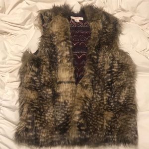 Faux fur vest with hood